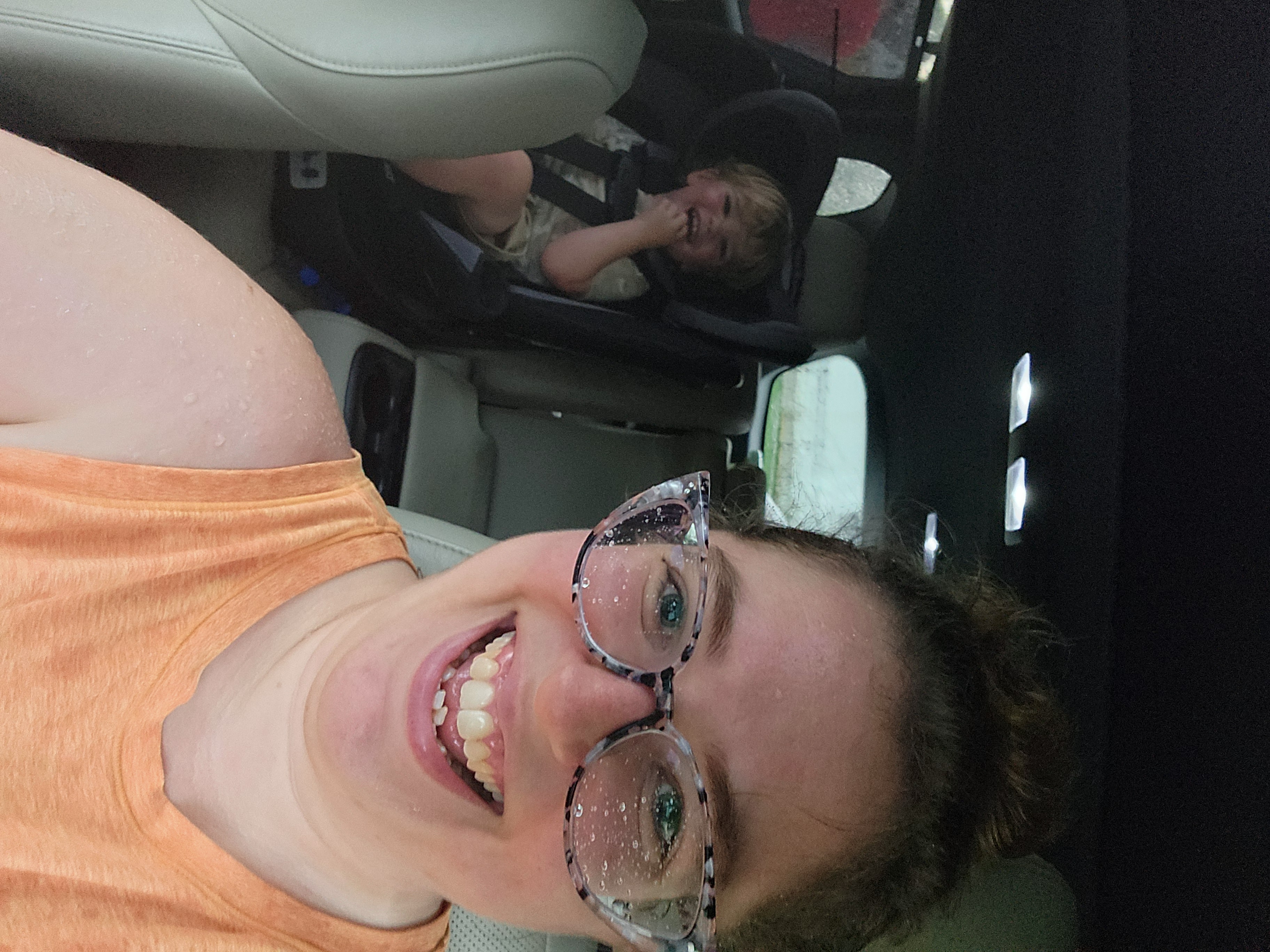 Caregiver and toddler smiling