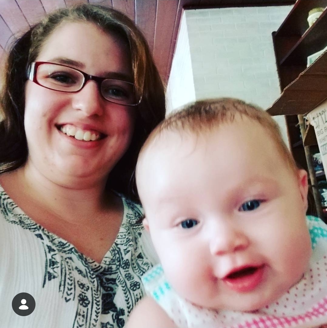 Taylor caring for an infant