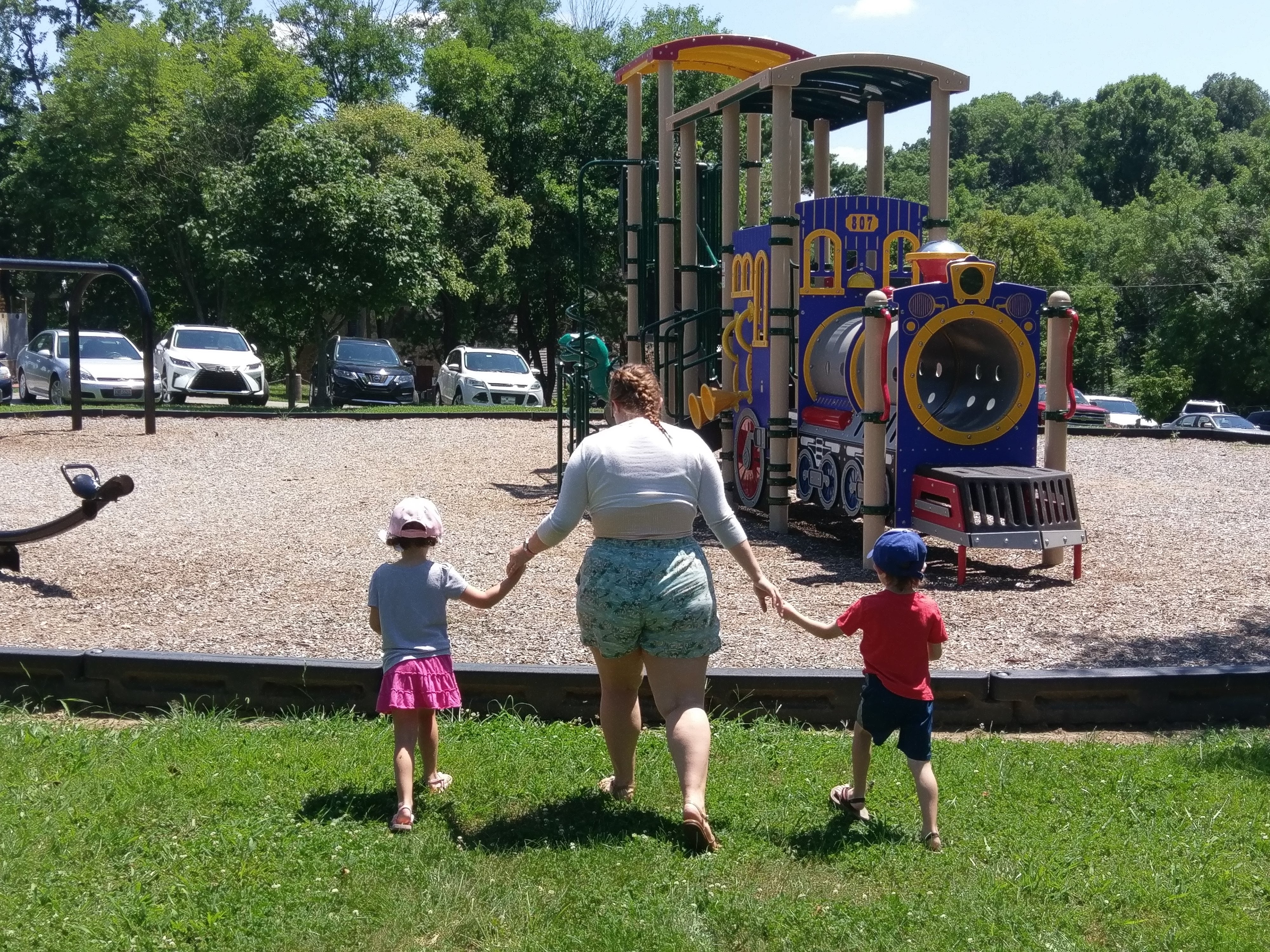 Taylor with twins at the playground